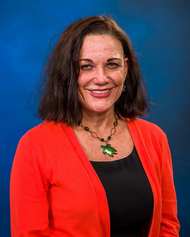 deborah guest looking at camera while smiling